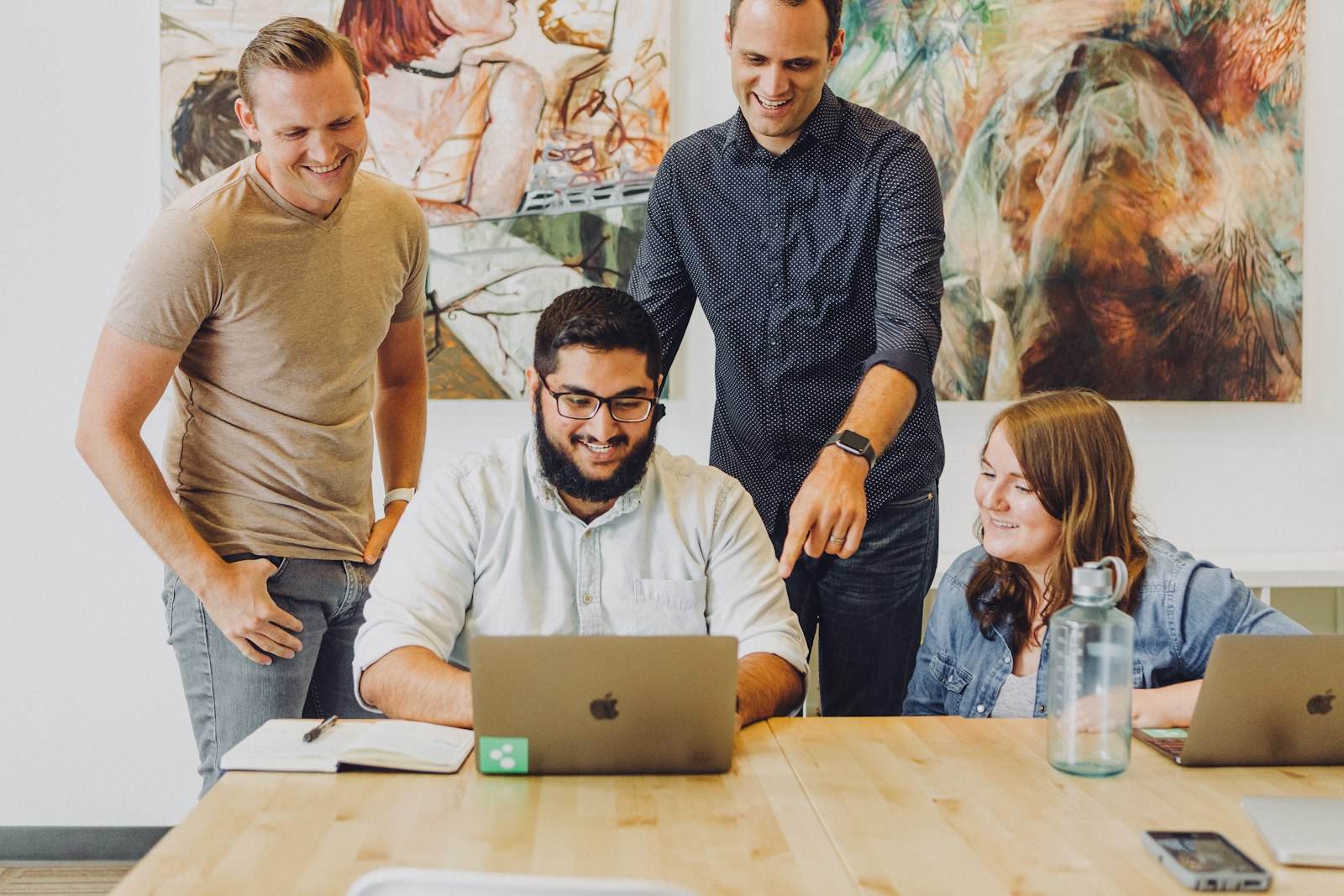 Startup team around a laptop