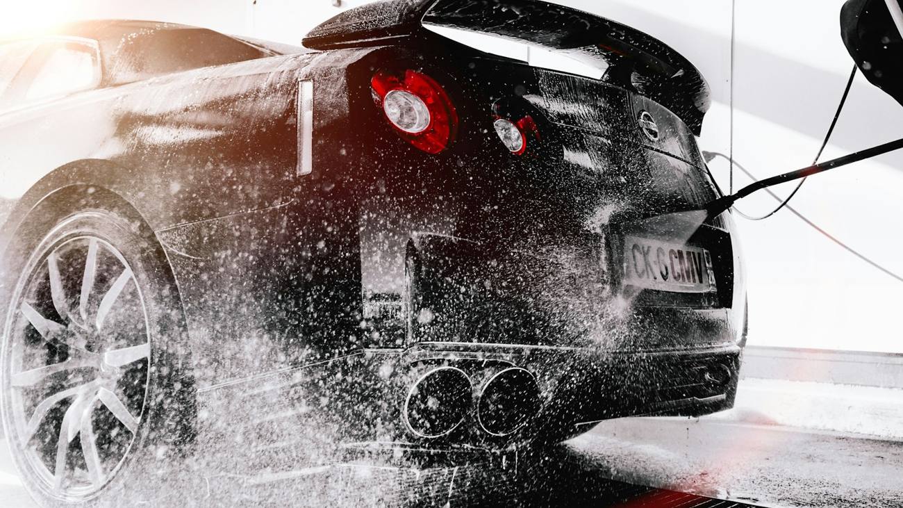 Pressure washing a car