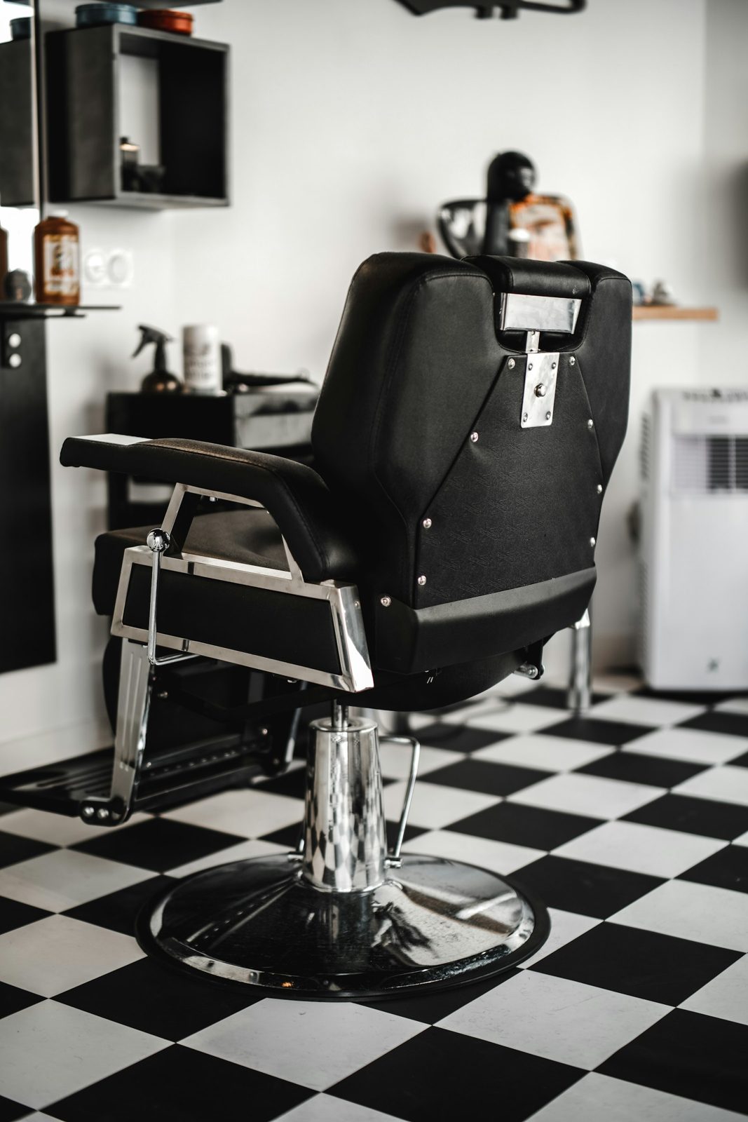 Barber chair on checkered floor
