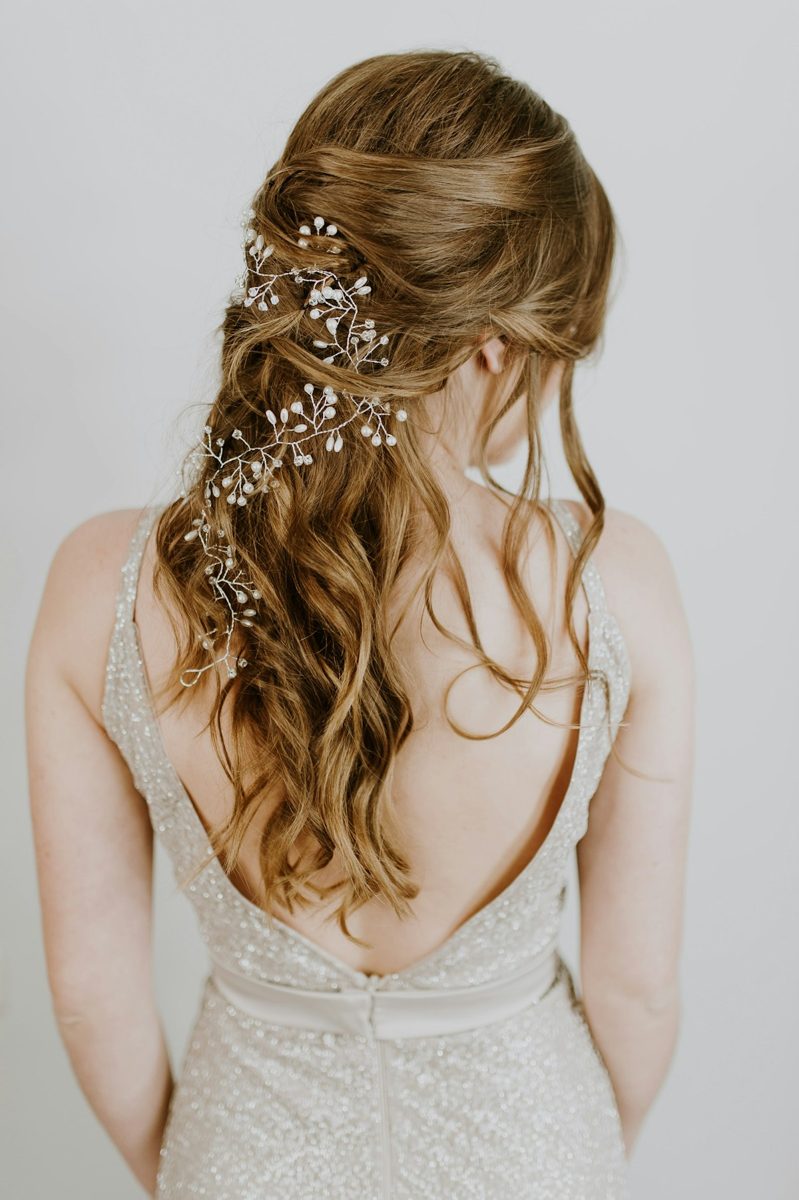 Woman wearing white sleeveless dress