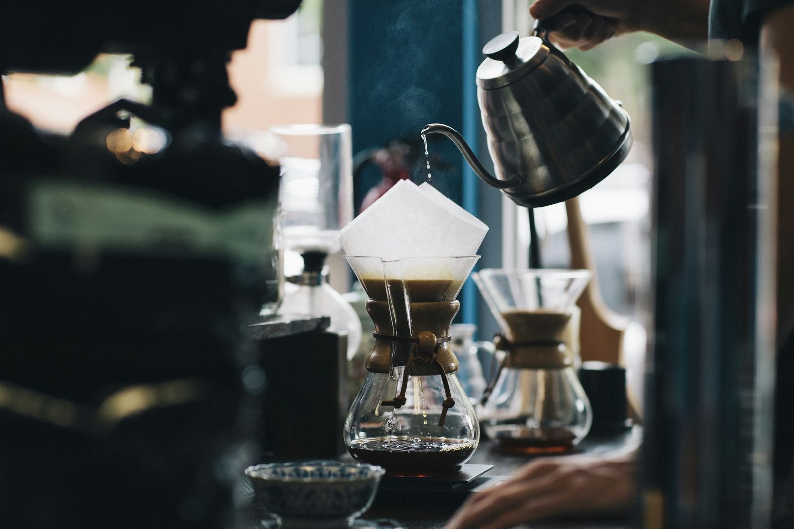Pour-over coffee brewing at a brew bar