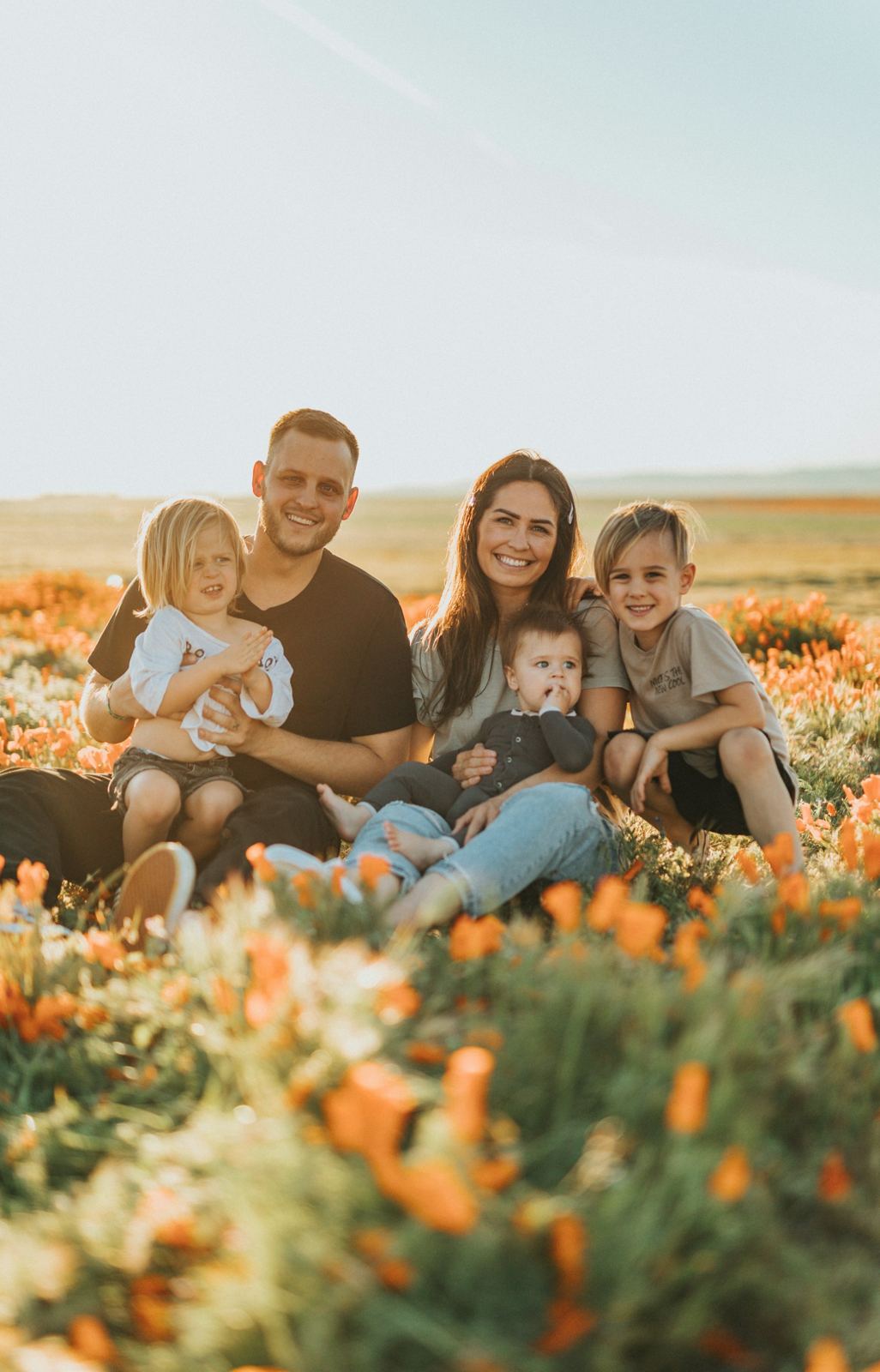 Family portrait in a flower field