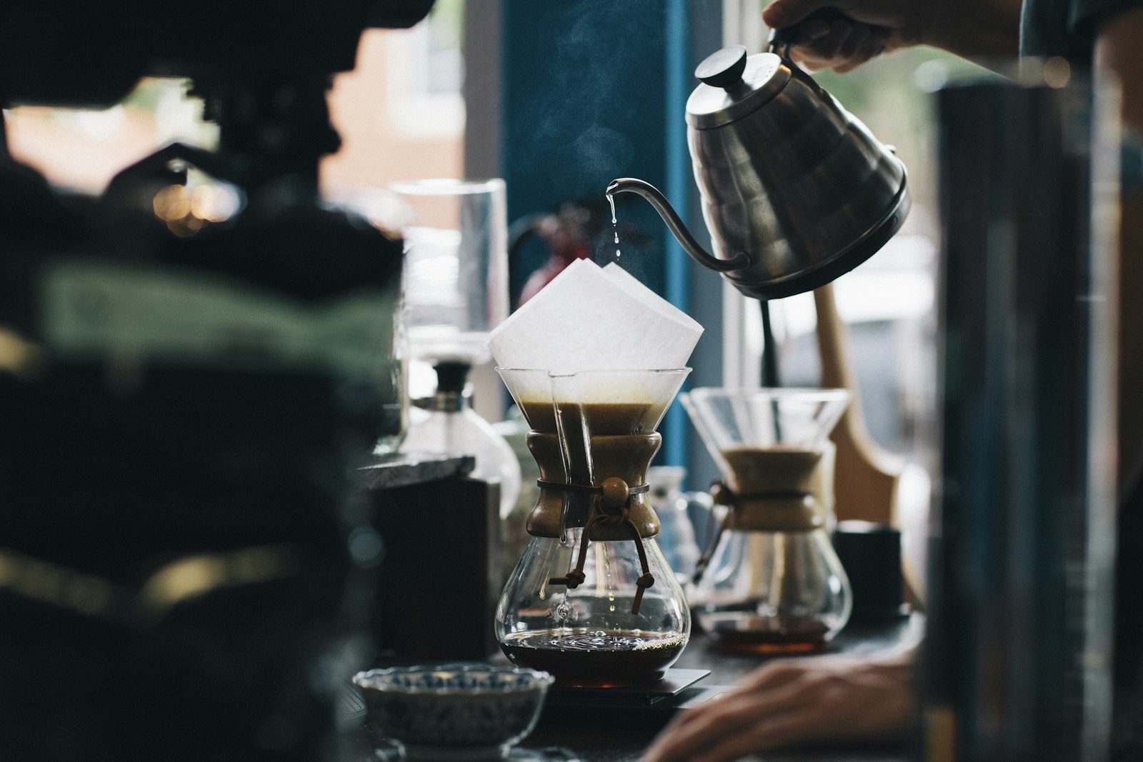 Pour-over coffee being brewed at the bar