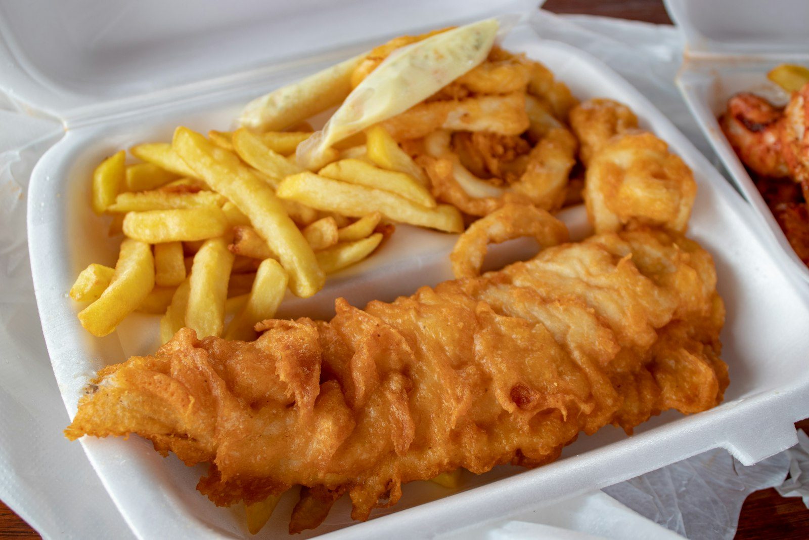 Beer-battered fish and chips with lemon
