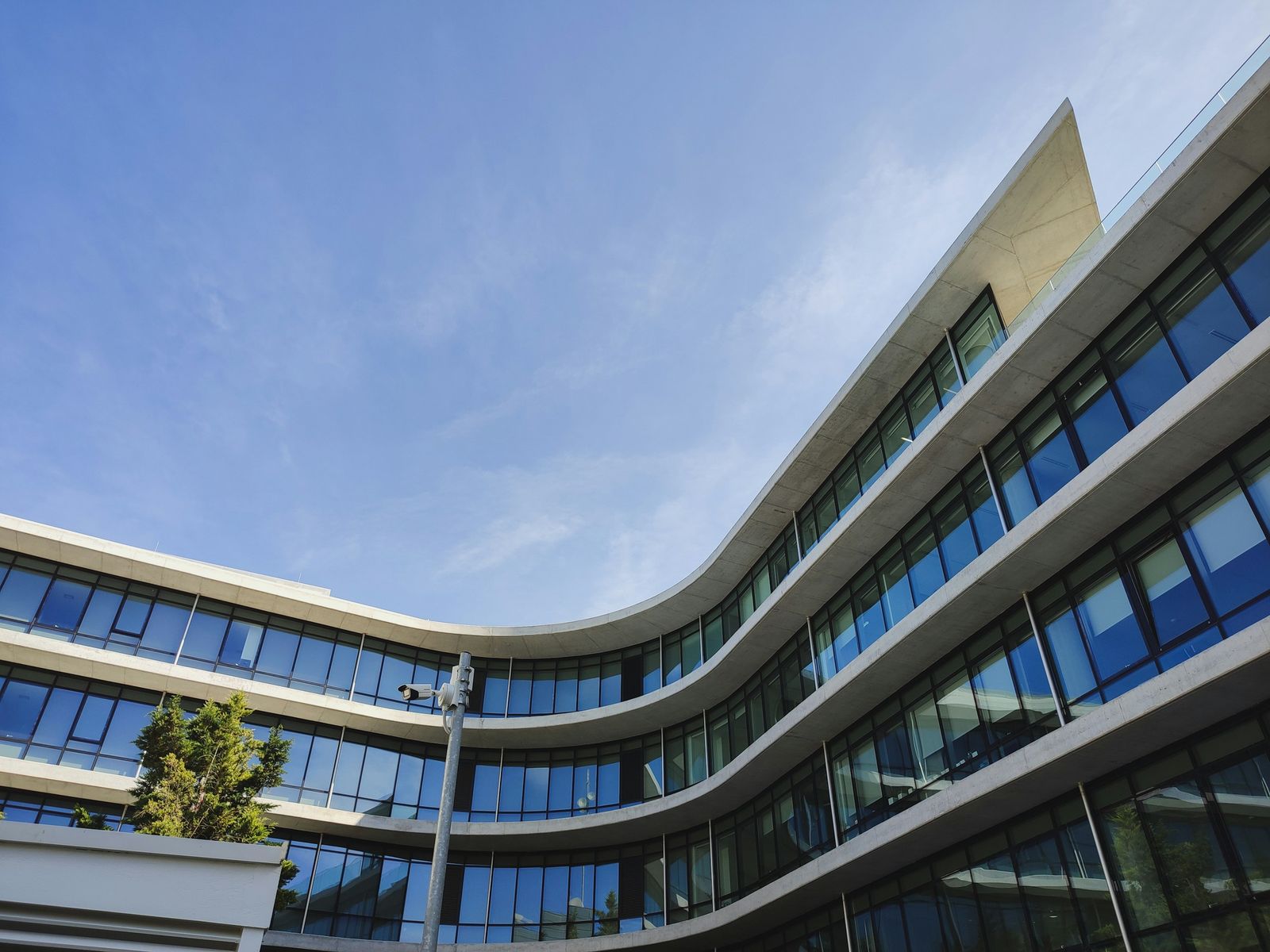 Curved glass facade of a healthcare building