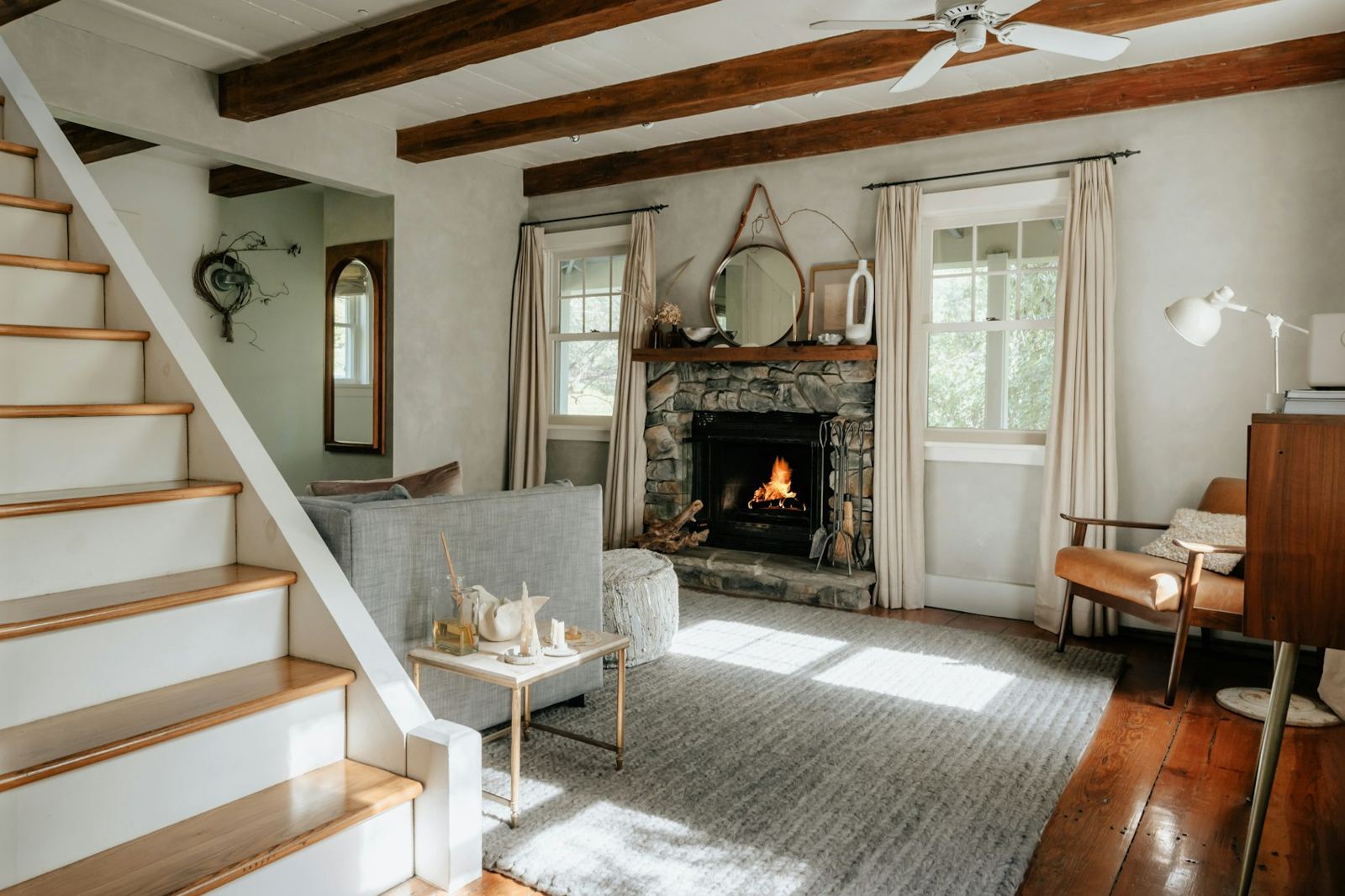 Cozy living room with a stone fireplace