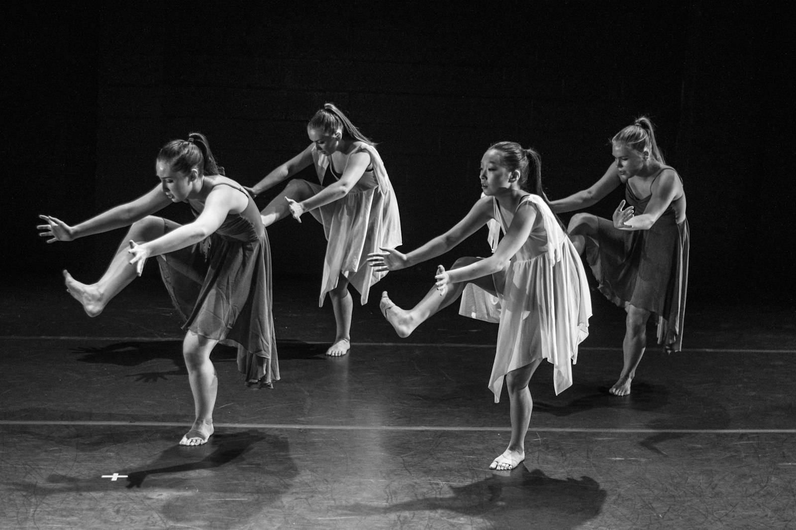 Dancers rehearsing in black and white