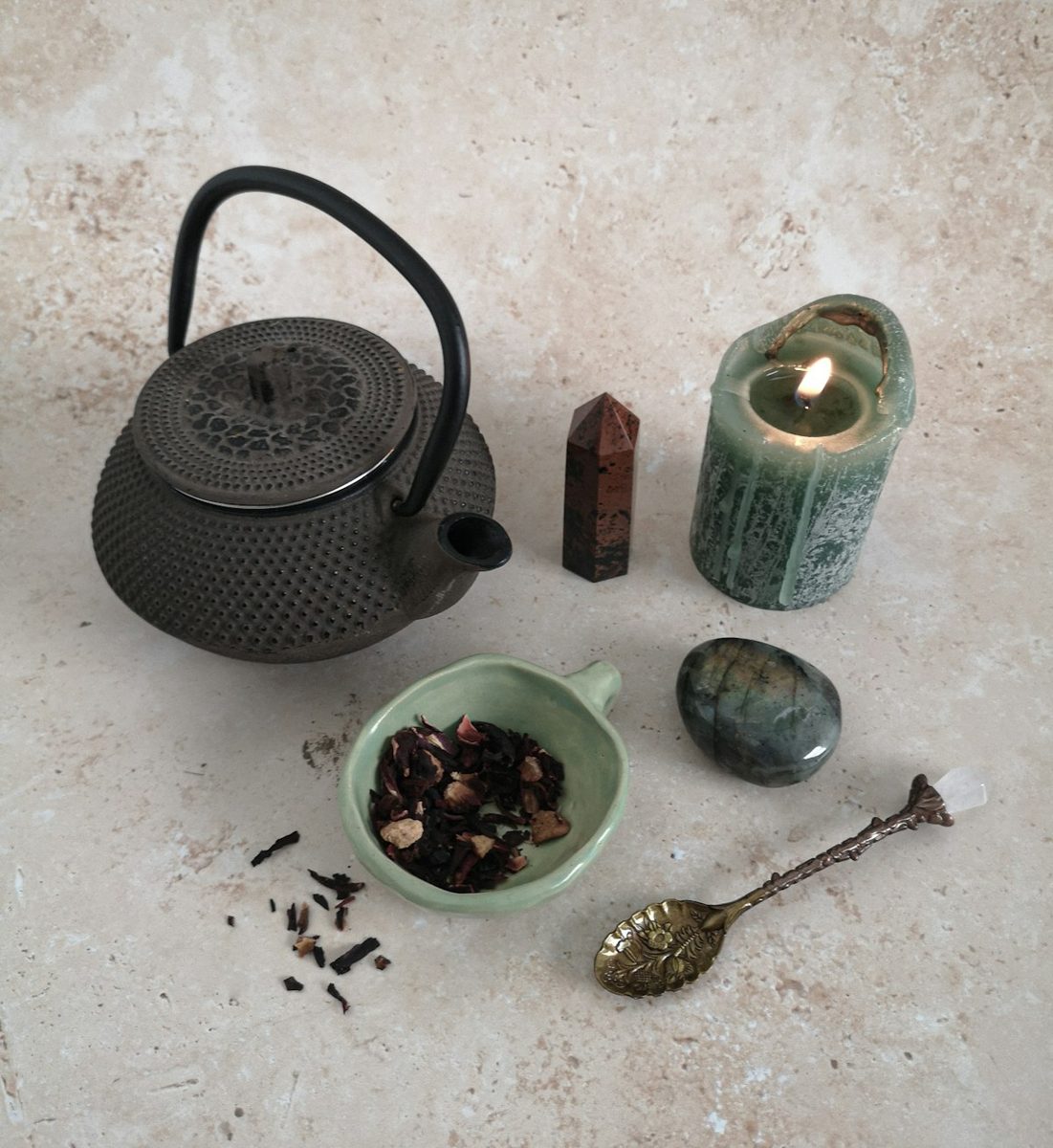 A candle and a bowl of food