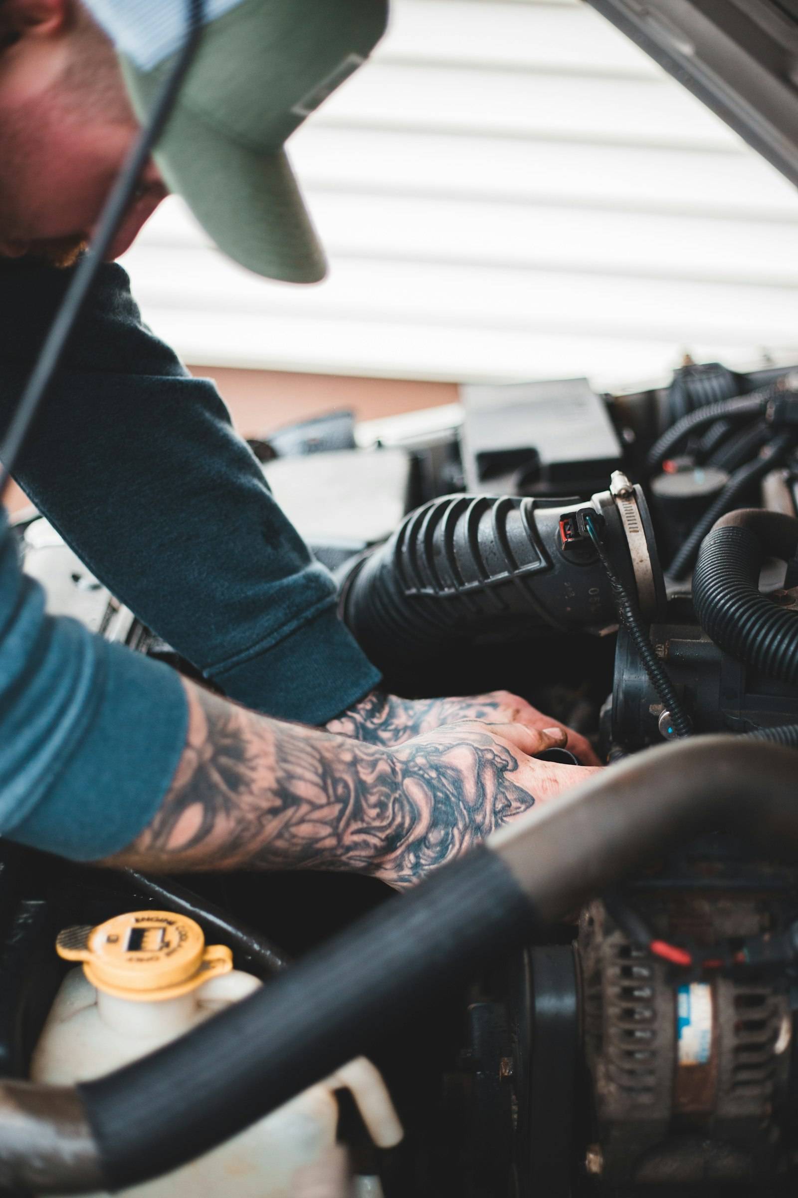 Technician working on an engine