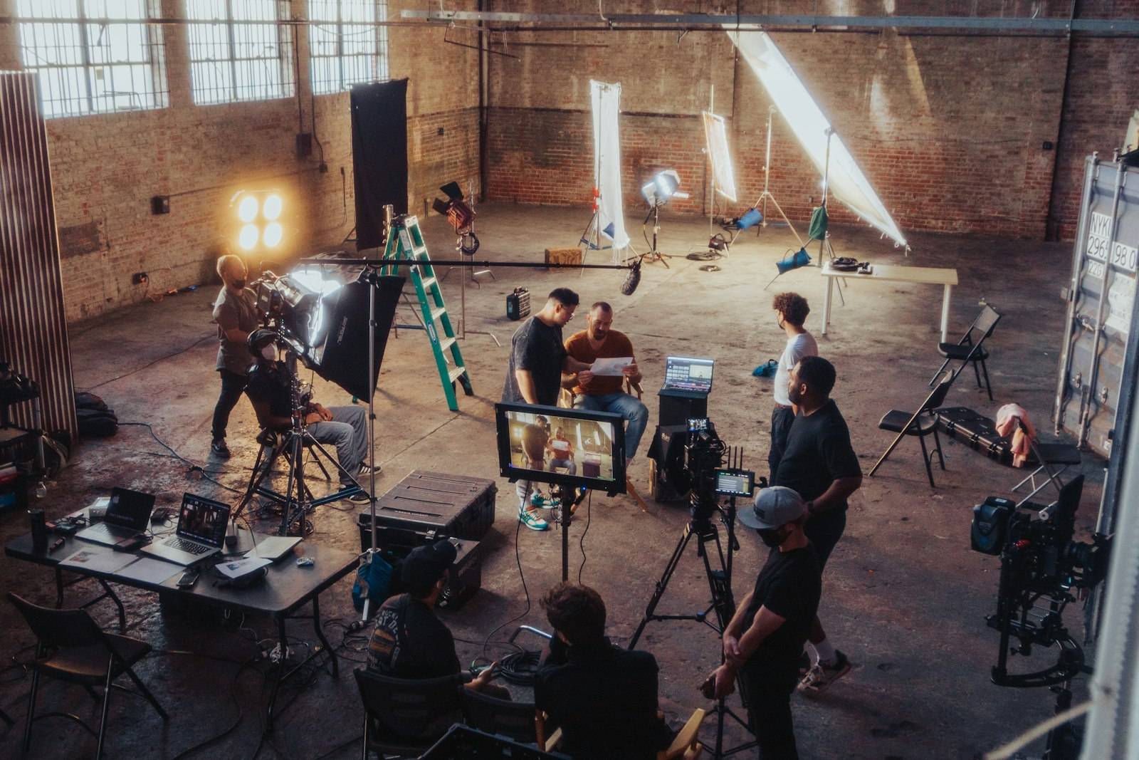 Film crew working on a large studio set