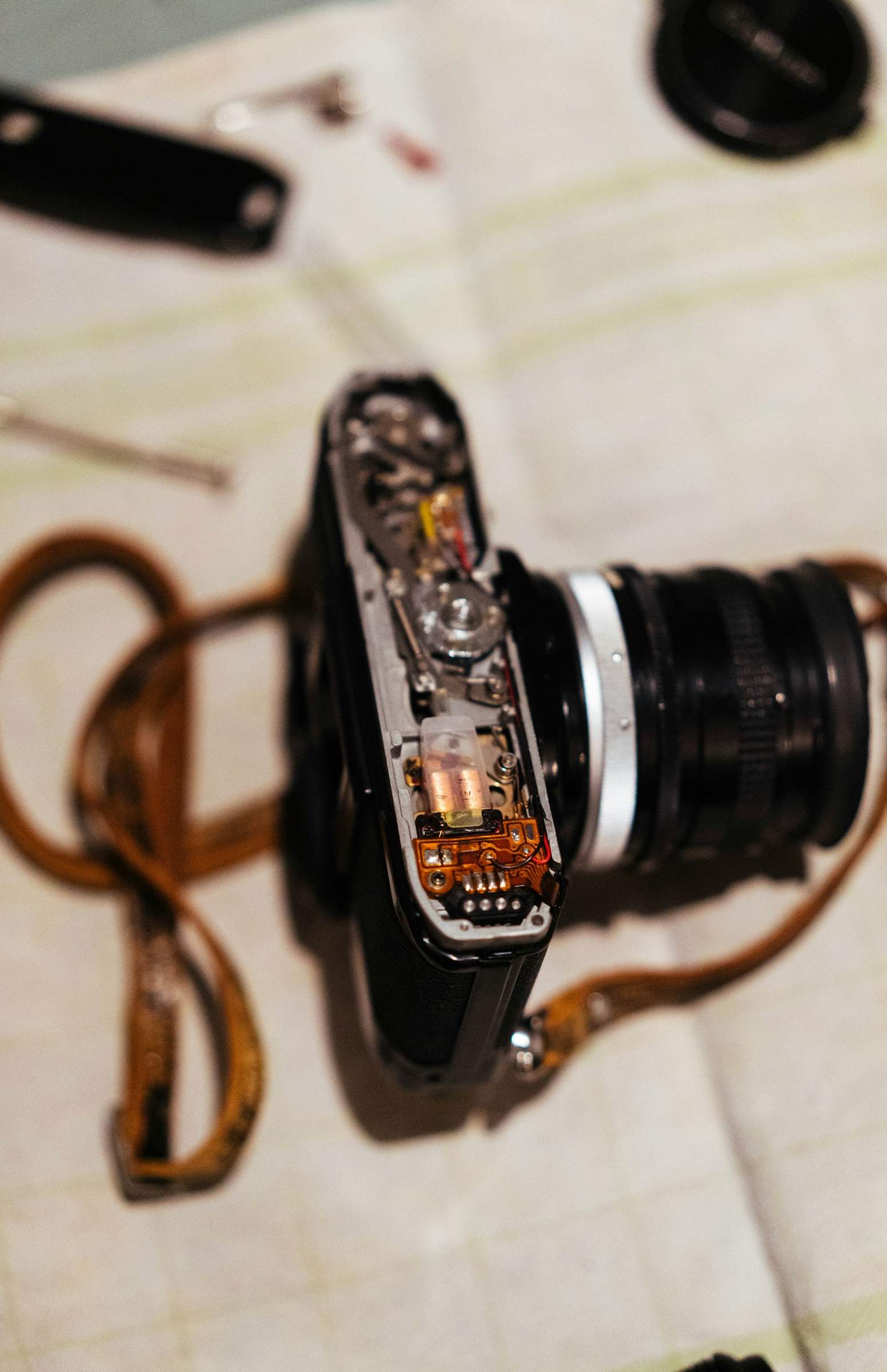 SLR camera on orange background