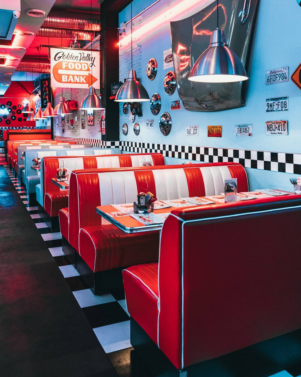 Red diner booths and checkered floor