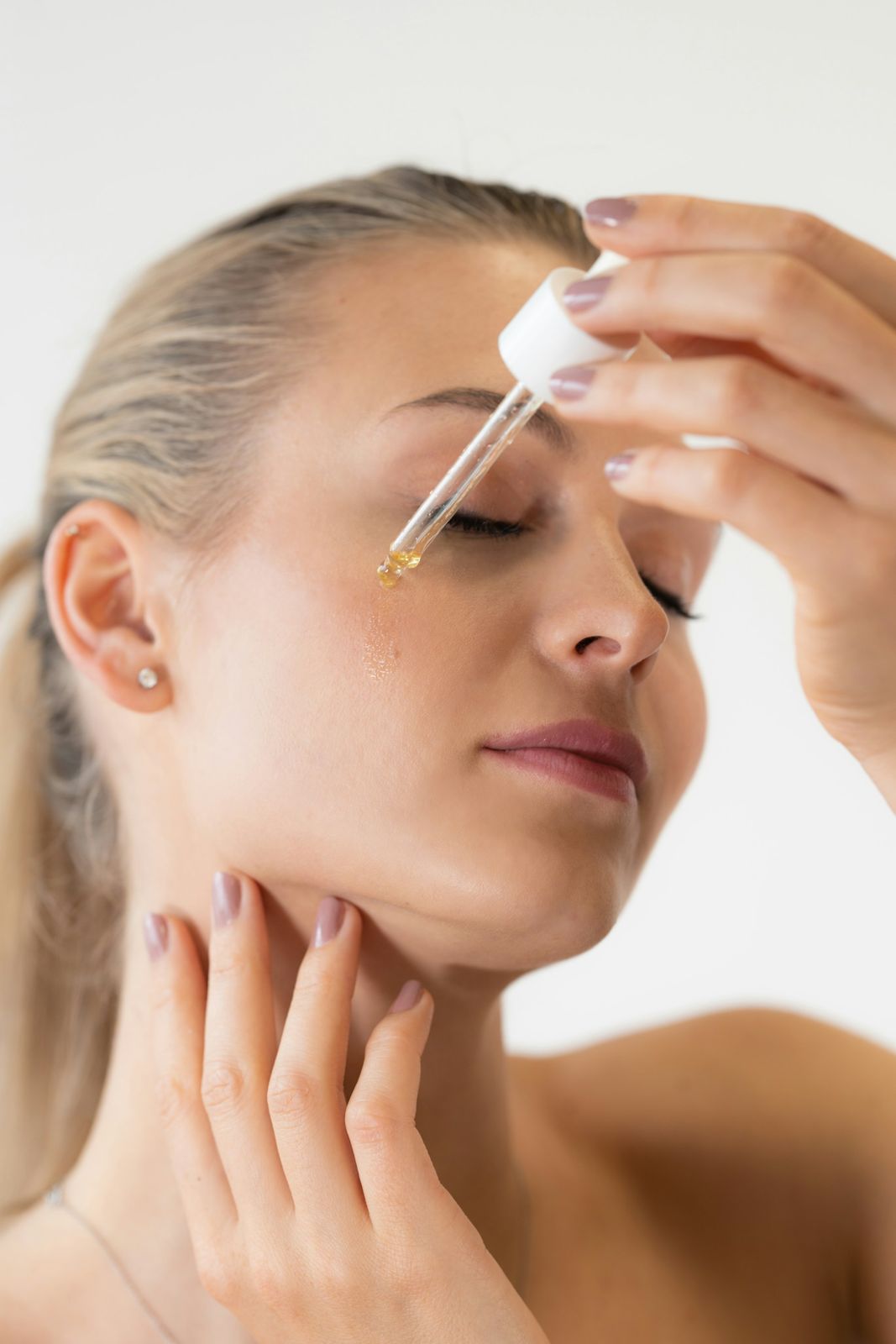 Applying facial serum