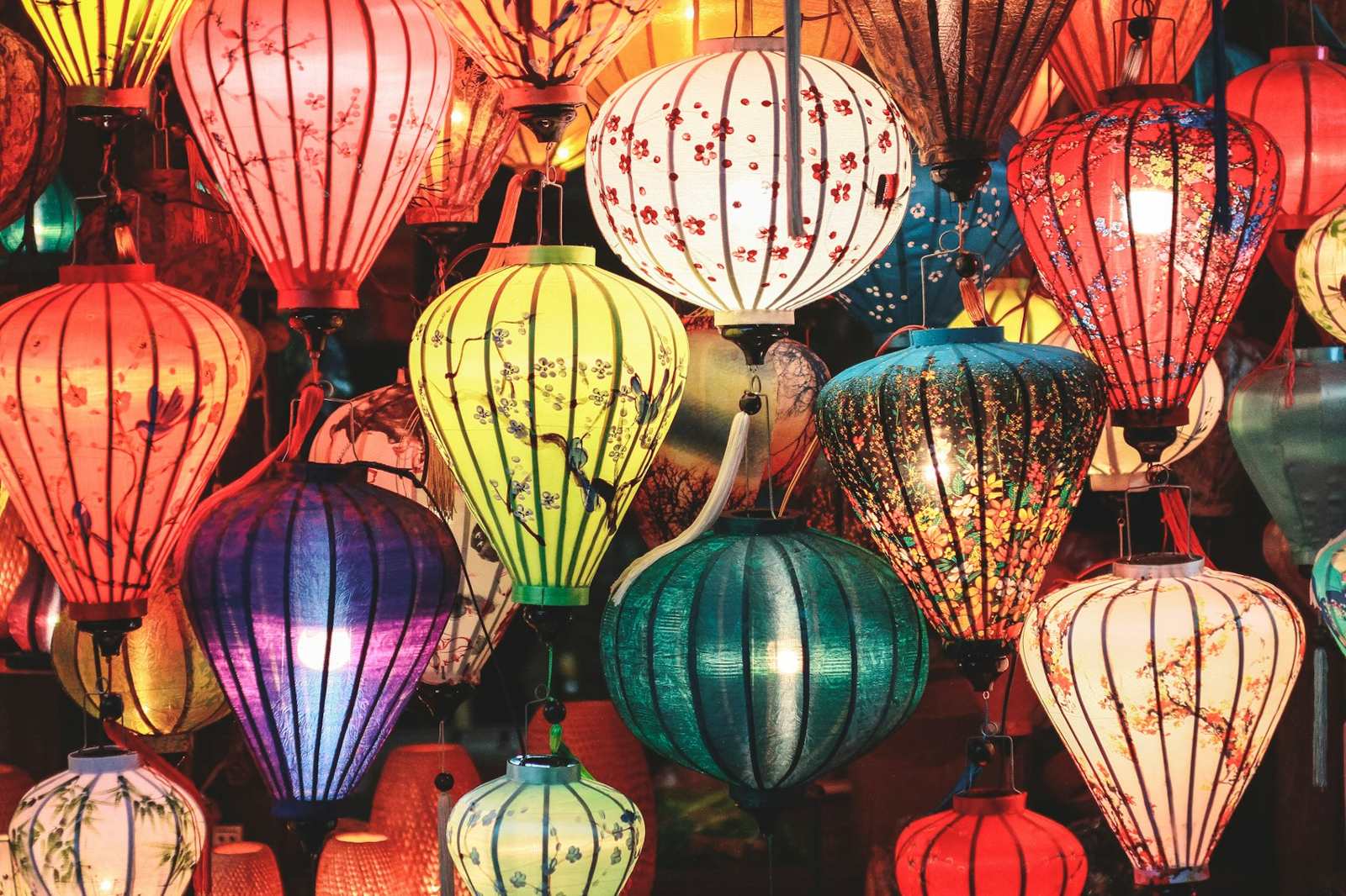 Silk lanterns in many colors glowing together