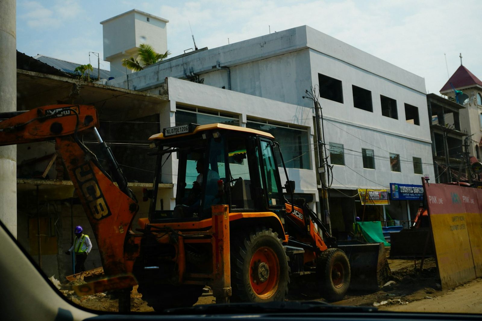 Backhoe loader working on a street site