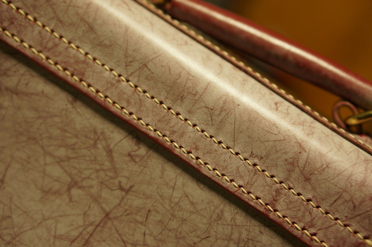 A close up of a piece of luggage on a table