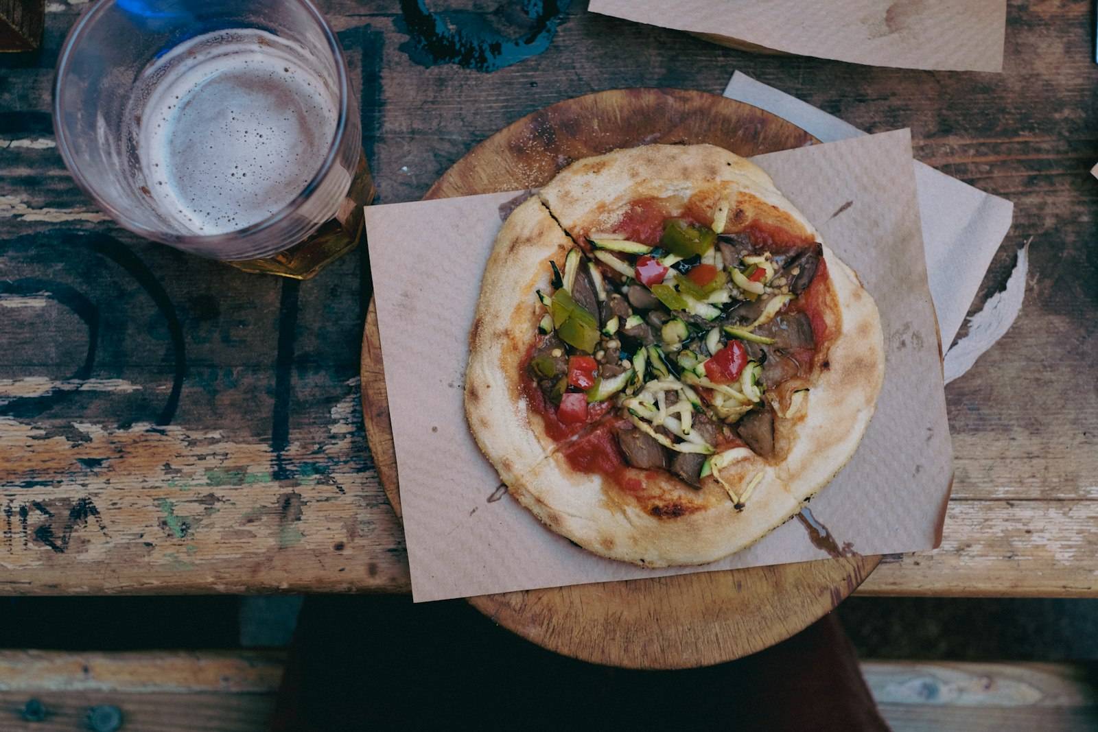 Pizzas and sides spread across a table